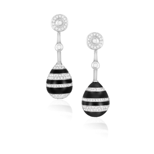 167 - A PAIR OF DIAMOND AND ONYX EARRINGS  Of opposing design, each drop-shaped motif set with carved onyx... 