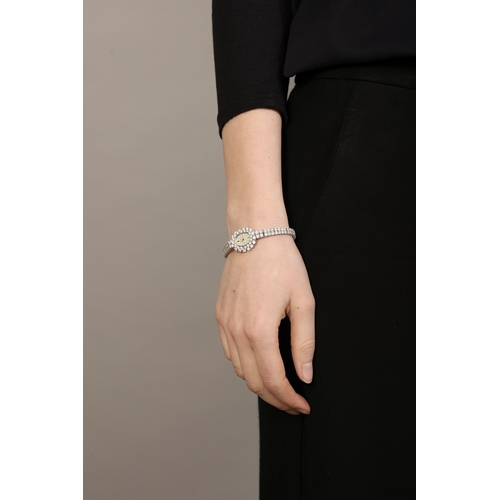 42 - A FINE LADY'S DIAMOND COCKTAIL WATCH, BY VACHERON CONSTANTIN, RETAILED BY MELLERIO, CIRCA 1960  17-j... 