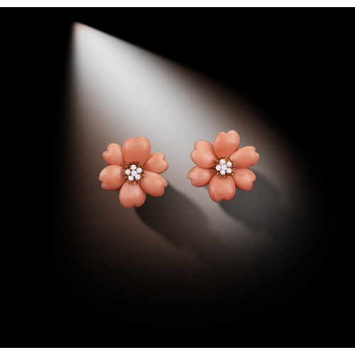 65 - A COLLECTIBLE PAIR OF CORAL AND DIAMOND 'ROSE DE NOËL' EARCLIPS, BY VAN CLEEF & ARPELS, CIRCA 1975  ... 