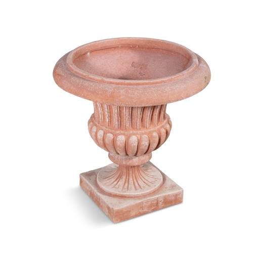 10 - AN ITALIAN 'POGGI UGO' TERRACOTTA GARDEN URN,  on pedestal base, 50cm high.