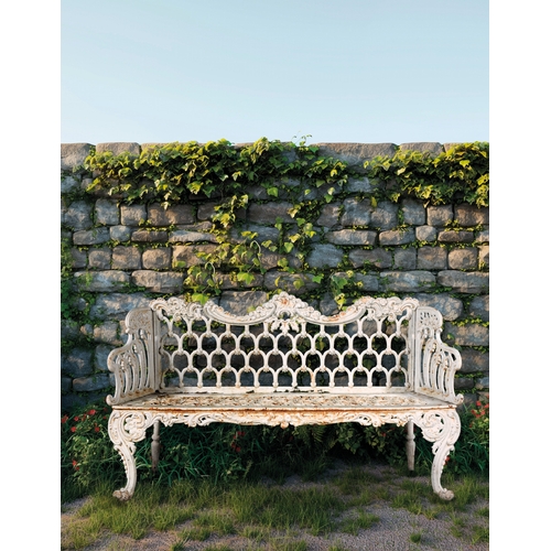 14 - A VICTORIAN WHITE PAINTED CAST IRON GARDEN BENCH   the arched foliate top rail above openwork back, ... 