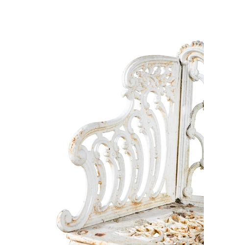 14 - A VICTORIAN WHITE PAINTED CAST IRON GARDEN BENCH   the arched foliate top rail above openwork back, ... 