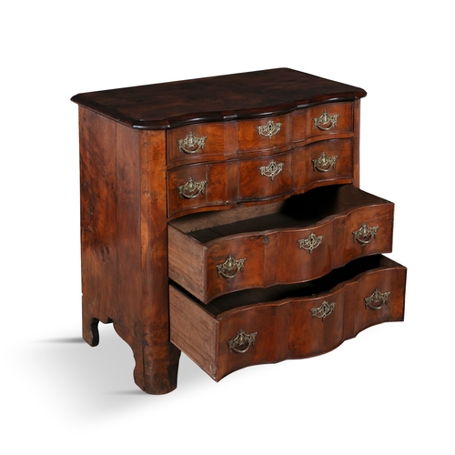 33 - A DUTCH SERPENTINE FRONT CHEST OF DRAWERS   the plain top above a four long drawers with brass drop ... 