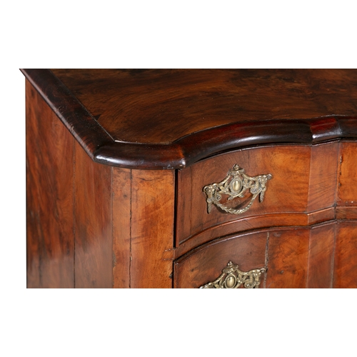 33 - A DUTCH SERPENTINE FRONT CHEST OF DRAWERS   the plain top above a four long drawers with brass drop ... 