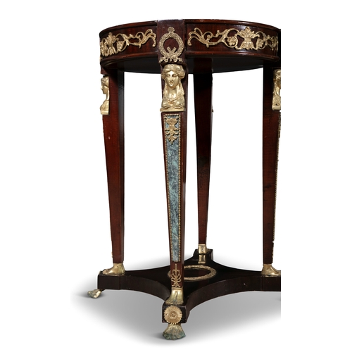 46 - AN EMPIRE STYLE CIRCULAR STAINED WOOD PIER TABLE,   raised on square column supports with brass sphi... 