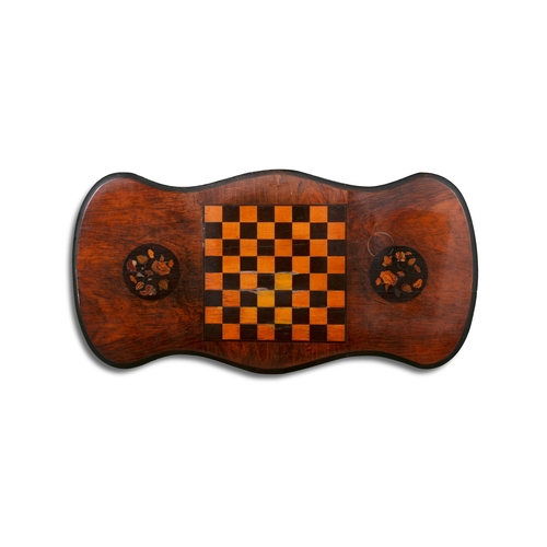 62 - A VICTORIAN WALNUT AND PARQUETRY GAMES TABLE  the shaped top centred with a chess board, on turned t... 