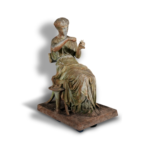 7 - A VICTORIAN CAST IRON FIGURE OF A CLASSICAL LADY,   seated on a klismos chair, holding a starfish, o... 