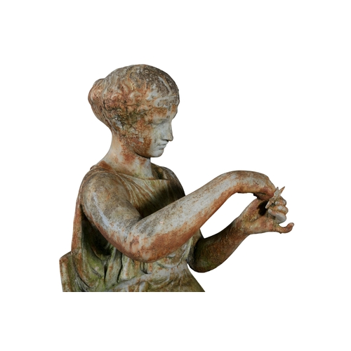 7 - A VICTORIAN CAST IRON FIGURE OF A CLASSICAL LADY,   seated on a klismos chair, holding a starfish, o... 