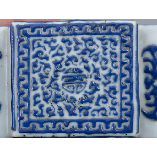 140 - A RARE 'OVERLAY GLASS' IMITATION SCROLL-SHAPED PORCELAIN BRUSH REST  INSCRIBED WITH THE MARK OF EMPE... 