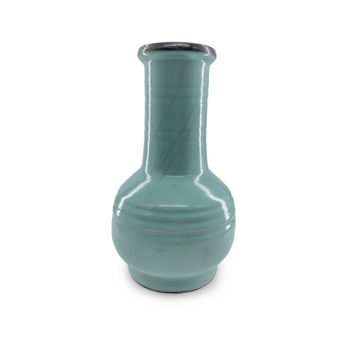 43 - A RU-TYPE VASE  仿汝窯 御題詩弦紋瓶  China  supported on a high footring with a slightly compressed globular ... 