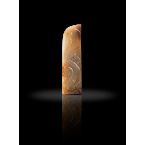 66 - A FINE OLIVE-CELADON AND CALCIFIED YELLOW JADE SCABBARD SLIDE  漢代 黃玉龍紋劍璏  China, Han dynasty (202 BC... 