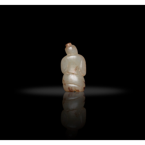 74 - A CELADON AND BROWN RUSSET JADE FIGURE  漢代 白玉带沁色人物  China, Han dynasty (202 BC–220 AD)  H: 3.1cm  PR... 