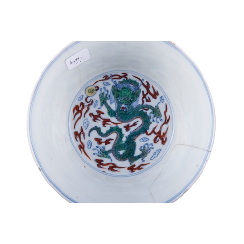 89 - A DOUCAI ‘DRAGON’ BOWL WITH APOCRYPHAL ZHENGDE MARK  清代 『正德年制』款 鬥彩雲龍紋碗  China, Qing dynasty  Decorat... 