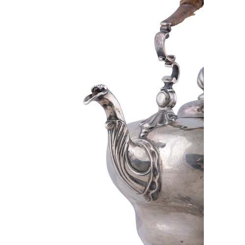 1 - A GEORGE II SILVER TEA-KETTLE ON STAND,   London c. 1751, with maker's mark of Thomas Whipman, with ... 