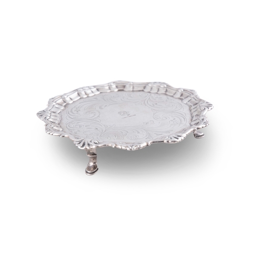 14 - A GEORGE II SMALL SILVER SALVER,  Dublin c. 1740, lacking makers mark, of shaped circular form, with... 