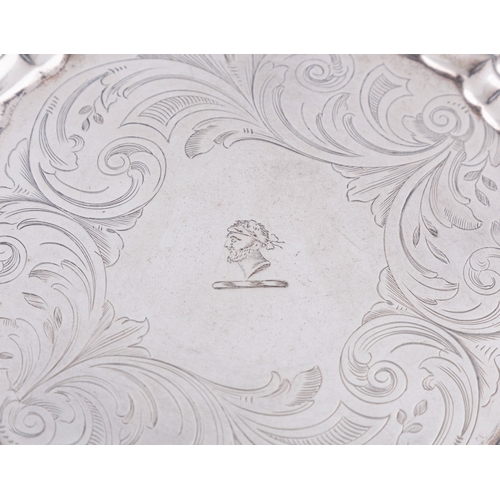 14 - A GEORGE II SMALL SILVER SALVER,  Dublin c. 1740, lacking makers mark, of shaped circular form, with... 