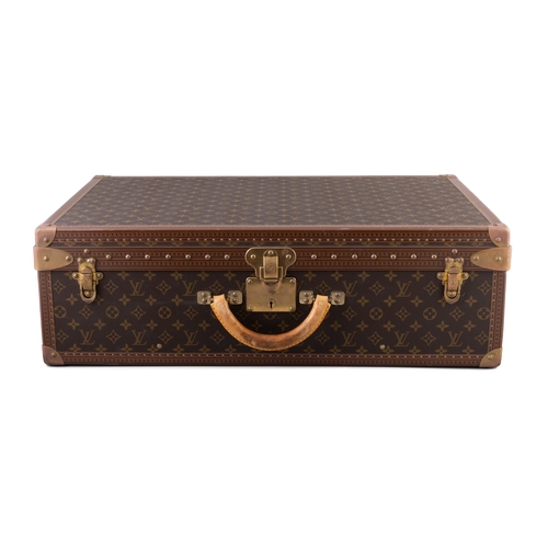 19 - A MODERN LOUIS VUITTON TRUNK CASE   brown monogram canvas, rounded leather carrying handle, with gol... 