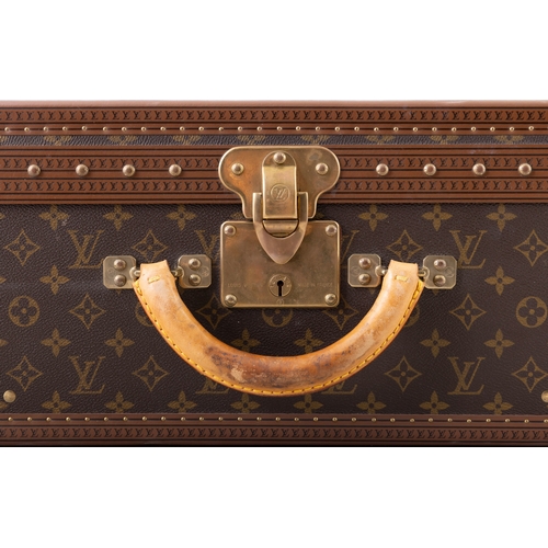 19 - A MODERN LOUIS VUITTON TRUNK CASE   brown monogram canvas, rounded leather carrying handle, with gol... 