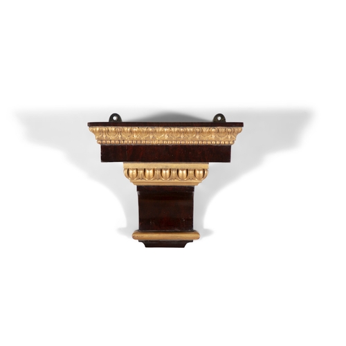 28 - A SMALL WALNUT AND PARCEL GILT RECTANGULR WALL BRACKET,   29cm wide, 26cm high, 20cm deep.