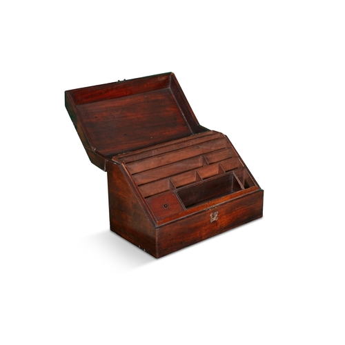 31 - A VICTORIAN MAHOGANY AND BRASS MOUNTED STATIONARY BOX,   the slope front opening to reveal a well-fi... 