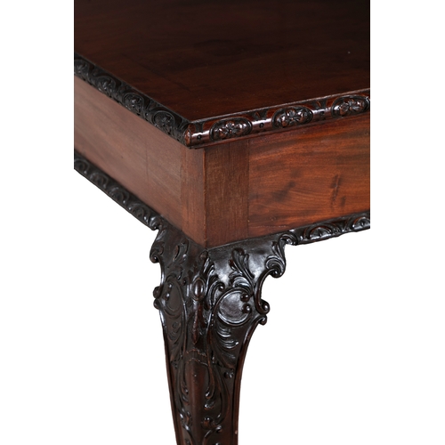 32 - A GEORGE III STYLE MAHOGANY RECTANGULAR SIDE TABLE,   with craved rim and raised on carved cabriole ... 