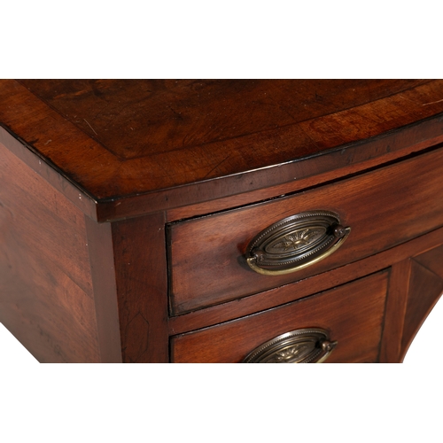 327 - A GEORGE III INLAID MAHOGANY BOWFRONT KNEEHOLE WRITING TABLE   fitted one long and two short drawers... 