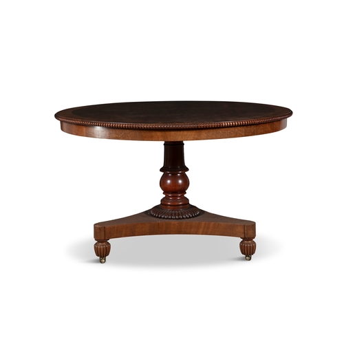 34 - A WILLIAM IV MAHOGANY CIRCULAR TABLE,   the top cross banded and decorated with a beaded border on a... 