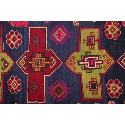 36 - A FLAT WOVEN KILIM. 287CM LONG, 146CM WIDE    the centre woven with a row of five geometric lozenges... 