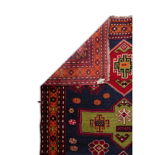 36 - A FLAT WOVEN KILIM. 287CM LONG, 146CM WIDE    the centre woven with a row of five geometric lozenges... 