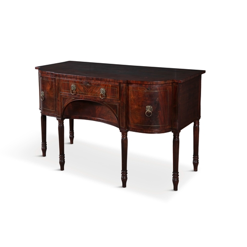 401 - A GEORGE IV MAHOGANY AND BRASS INLAID BOWFRONT SIDEBOARD,   the shaped rectangular top above a long ... 