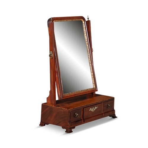 45 - A GEORGE III MAHOGANY CRUTCH FRAME TOILET MIRROR   the rectangular glass plate with gilt slip, on ba... 