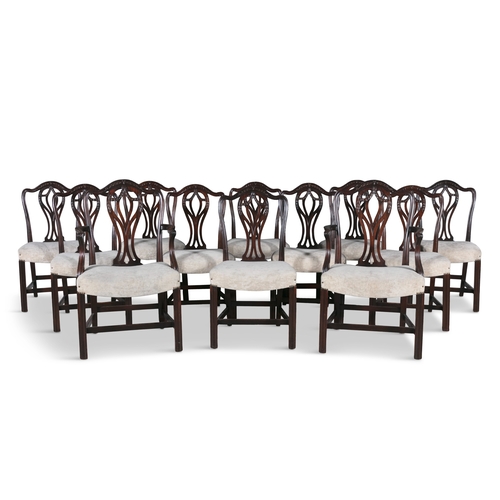 68 - A SET OF TWLEVE GEORGIAN REVIVAL MAHOGANY DINING CHAIRS, c. 1900,    comprising two carvers and ten ... 