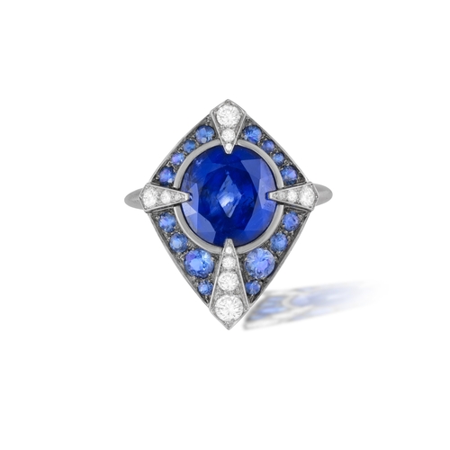 108 - LANGI: A SAPPHIRE AND DIAMOND DRESS RING  The oval brilliant step-cut sapphire weighing 2.92cts with... 