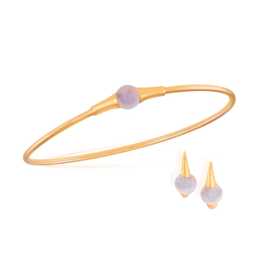 11 - POMELLATO: A MOONSTONE M'AMA NON M'AMA BANGLE WITH EARRINGS EN SUITE  Each moonstone cabochon within... 