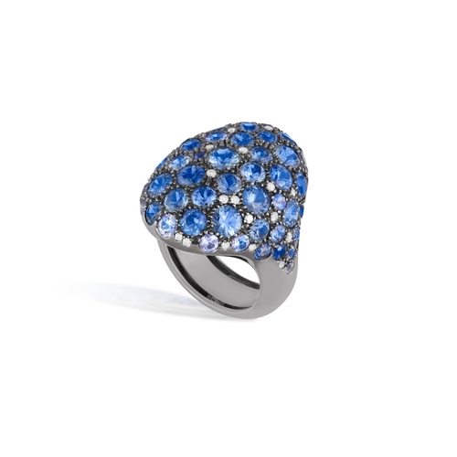 110 - A SAPPHIRE AND DIAMOND DRESS RING  Of oval bombé design, pavé-set with circular-cut sapphires with b... 