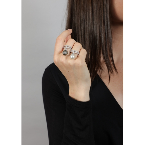 117 - REPOSSI: A PAIR OF CULTURED PEARL AND DIAMOND RINGS  Each double shank pavé-set with brilliant-cut d... 