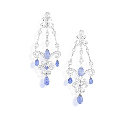 119 - CHOPARD: A PAIR OF SAPPHIRE AND DIAMOND 'COPACABANA' PENDENT EARRINGS  Of chandelier scrolling desig... 