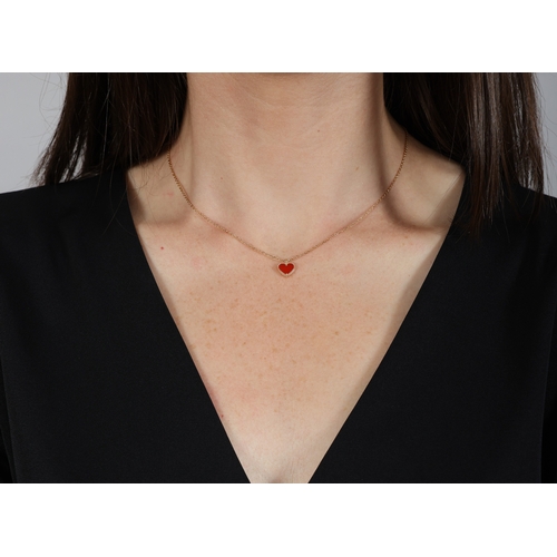 15 - VAN CLEEF & ARPELS: A CARNELIAN 'SWEET HEARTS' PENDANT ON CHAIN, WITH BRACELET EN SUITE  The heart-s... 