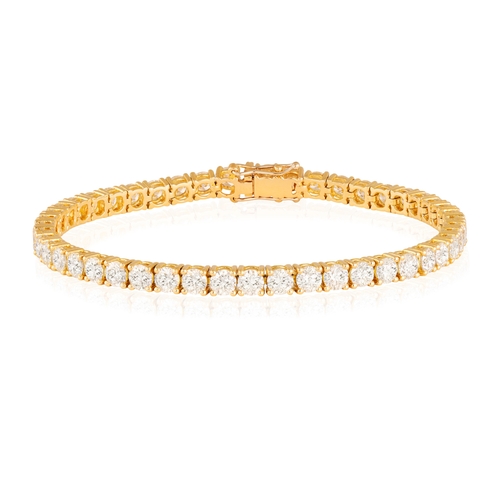 151 - A DIAMOND LINE BRACELET  Composed of a continuous line of brilliant-cut diamonds within claw-setting... 