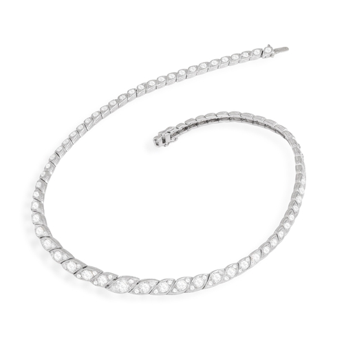 168 - A DIAMOND LINE NECKLACE  Comprising of graduating old brilliant-cut diamonds in scalloped collets in... 