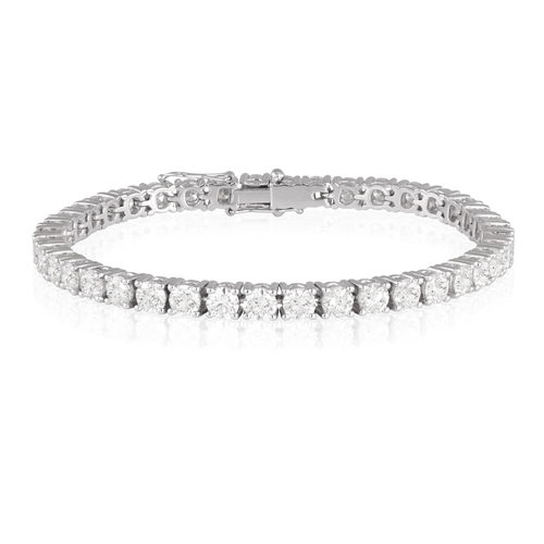 169 - A DIAMOND LINE BRACELET  Composed of a continuous line of brilliant-cut diamonds within claw-setting... 