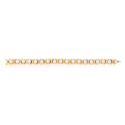 171 - A CULTURED PEARL AND DIAMOND BRACELET  The articulated bracelet set with a line of cultured pearl be... 