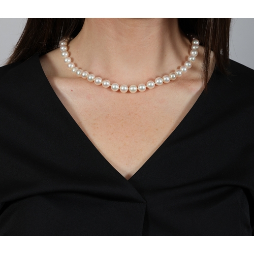 180 - MIKIMOTO: A CULTURED PEARL NECKLACE  Composed of a single row of cultured pearls of white tint measu... 