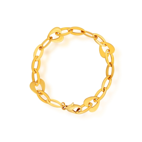 2 - FRED PARIS: A GOLD BRACELET  The chain composed of openwork oval and heart-shaped polished gold link... 