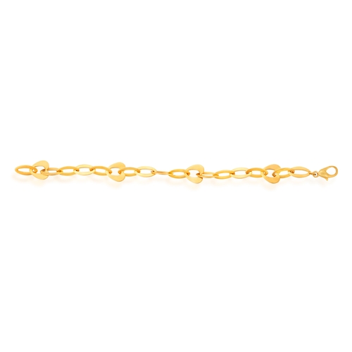 2 - FRED PARIS: A GOLD BRACELET  The chain composed of openwork oval and heart-shaped polished gold link... 