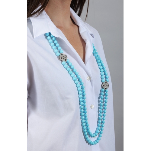 203 - A TURQUOISE AND DIAMOND NECKLACE(S)  Composed of two rows of turquoise beads, spaced by two diamond-... 