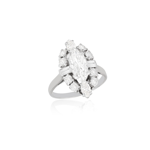 210 - A DIAMOND DRESS RING  The central old marquise-cut diamond weighing approximately 1.15cts, within a ... 