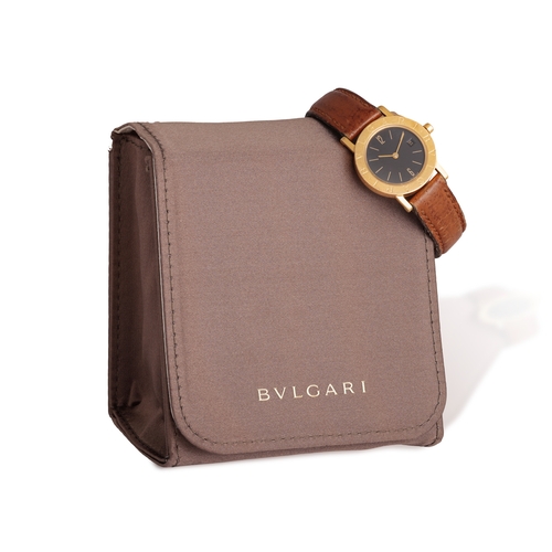 214 - BULGARI: AN 18K GOLD 'BVLGARI BVLGARI' WRISTWATCH  The 8-jewel Cal-712/62 quartz movement, black dia... 