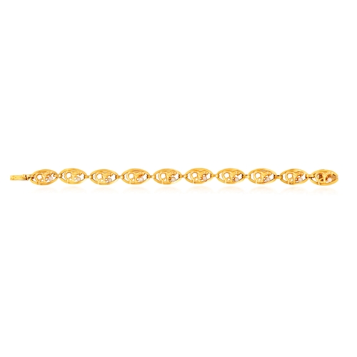 32 - AN ART NOUVEAU GOLD AND SEED PEARL BRACELET, CIRCA 1900  Composed of a series of openwork oval links... 