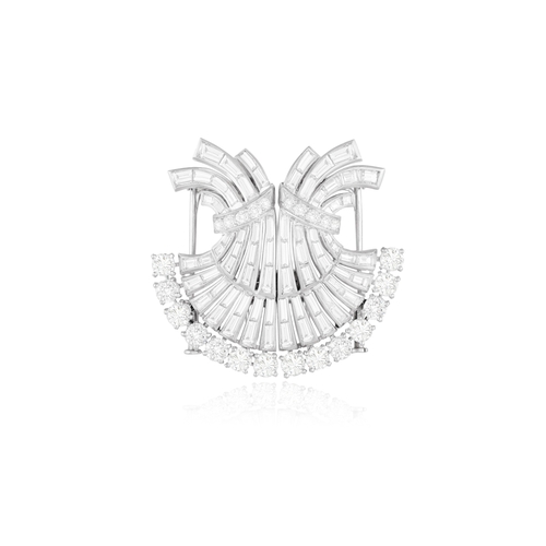 35 - BOUCHERON: A FINE DIAMOND DOUBLE-CLIP BROOCH, CIRCA 1945-50  Of openwork fan shape, set with brillia... 